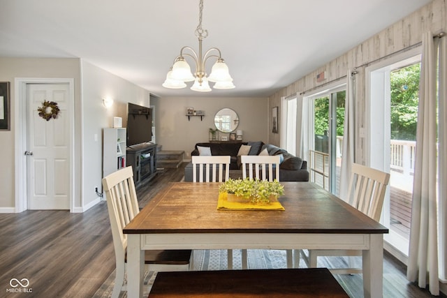 897 Wildwood Rd, North Vernon, IN 47265 - dining room featuring a chandelier and dark wood-style floors
