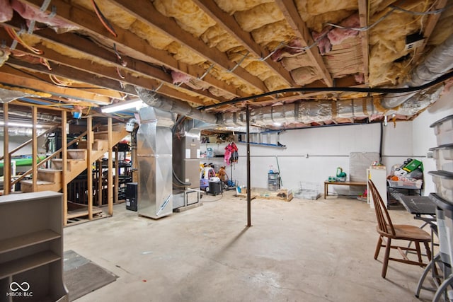 897 Wildwood Rd, North Vernon, IN 47265 - unfinished basement featuring heating unit and stairs