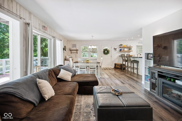 897 Wildwood Rd, North Vernon, IN 47265 - living area with healthy amount of natural light and wood finished floors