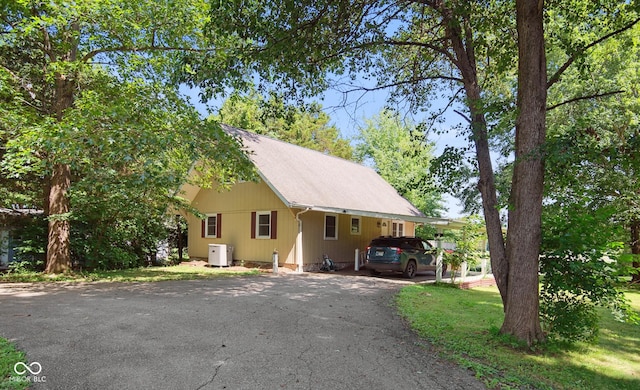 897 Wildwood Rd, North Vernon, IN 47265 - view of front of home featuring asphalt driveway and an attached carport