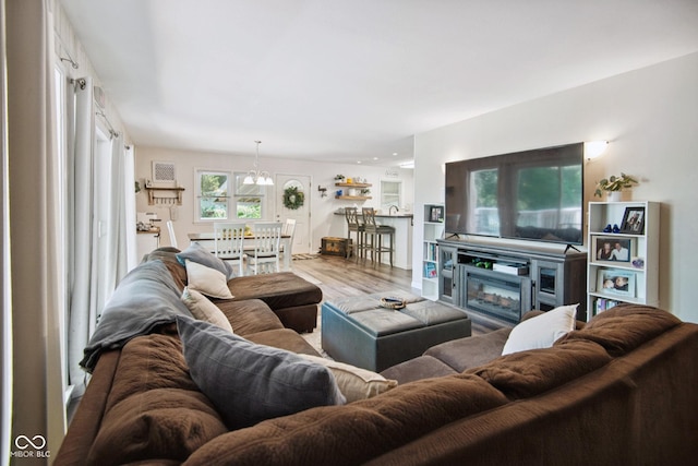 897 Wildwood Rd, North Vernon, IN 47265 - living room with wood finished floors and a chandelier