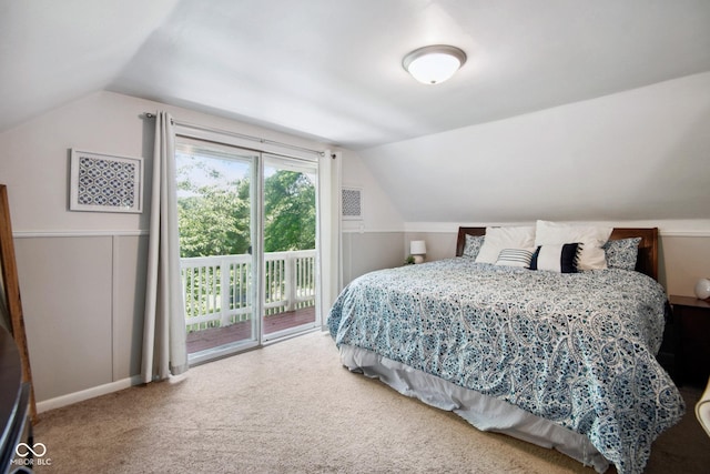 897 Wildwood Rd, North Vernon, IN 47265 - carpeted bedroom with access to exterior and vaulted ceiling