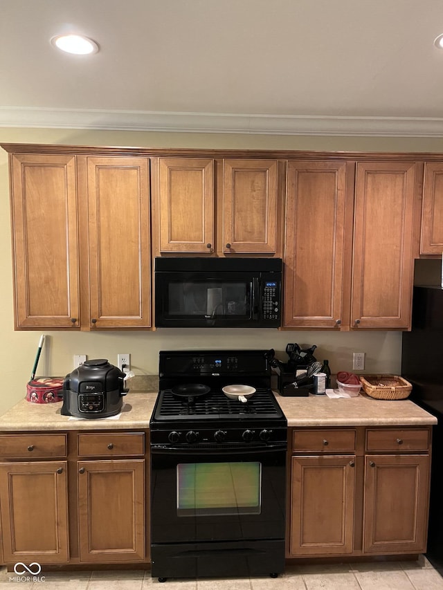 3547 Heathcliff Ct, Westfield, IN 46074 - kitchen with black appliances, crown molding, light countertops, brown cabinetry, and recessed lighting