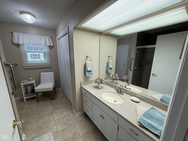 56 E Colony Acres Dr, Brazil, IN 47834 - bathroom with tile patterned floors, a shower stall, and vanity