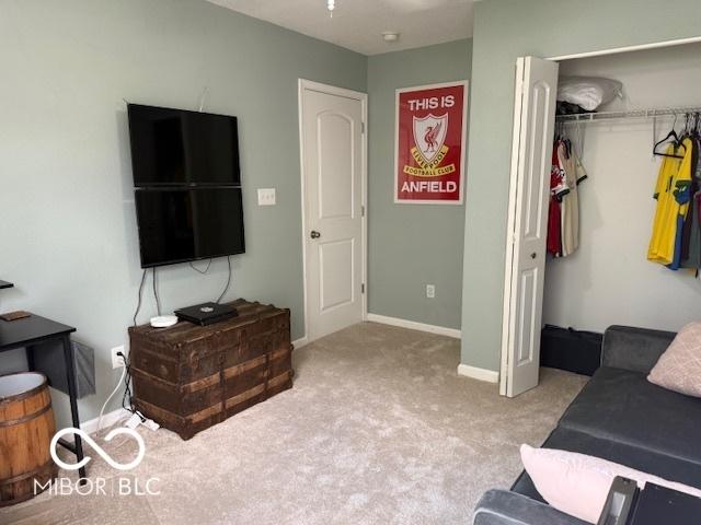 5714 High Timber Ln, Indianapolis, IN 46235 - living area with carpet flooring and baseboards