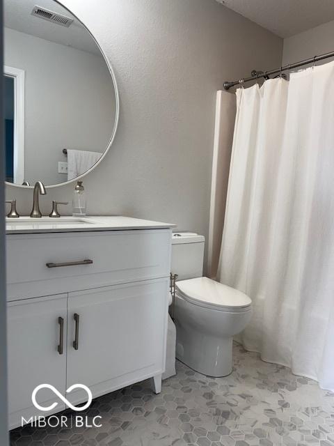 5714 High Timber Ln, Indianapolis, IN 46235 - bathroom featuring vanity and curtained shower