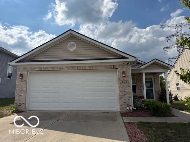 5714 High Timber Ln, Indianapolis, IN 46235 - ranch-style house featuring brick siding, driveway, and an attached garage
