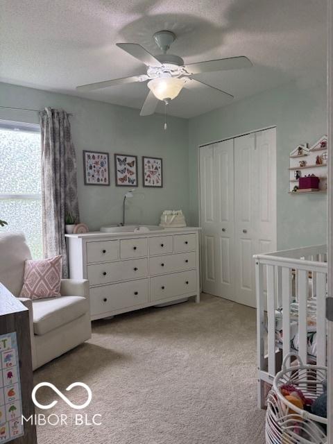 5714 High Timber Ln, Indianapolis, IN 46235 - bedroom featuring a closet, light colored carpet, and ceiling fan