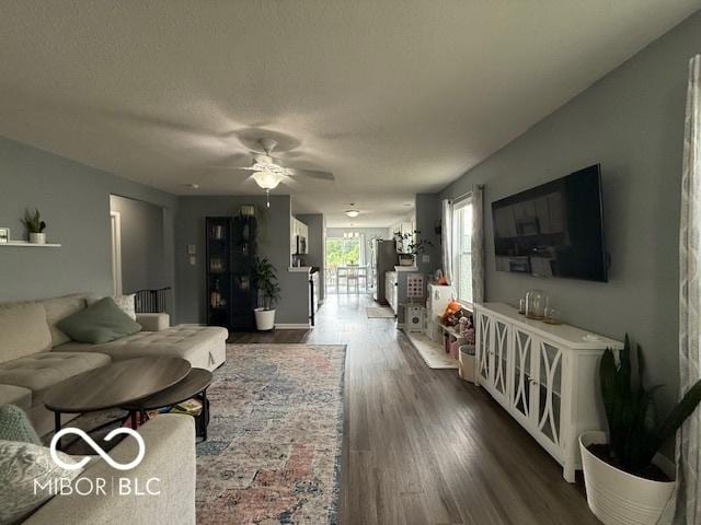 5714 High Timber Ln, Indianapolis, IN 46235 - living room with a ceiling fan, dark wood-type flooring, and radiator