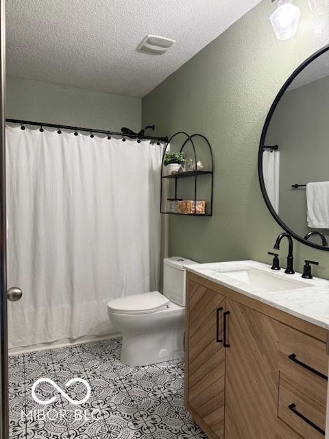 5714 High Timber Ln, Indianapolis, IN 46235 - bathroom with vanity, a textured ceiling, tile patterned floors, and curtained shower