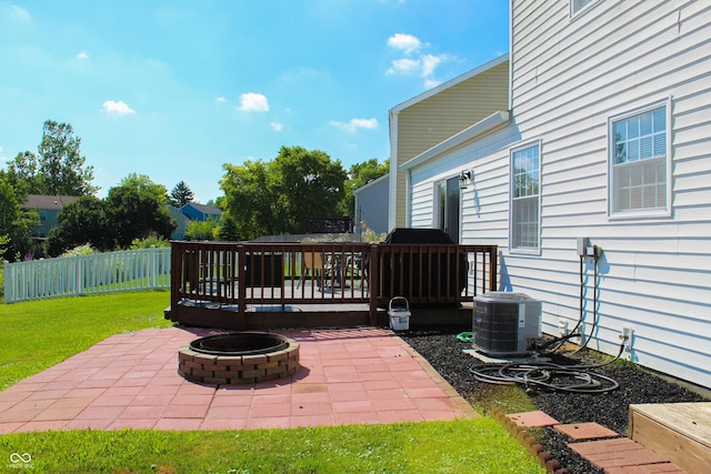 8017 Cardinal Cv W, Indianapolis, IN 46256 - fenced backyard with a fire pit, a deck, and a patio area
