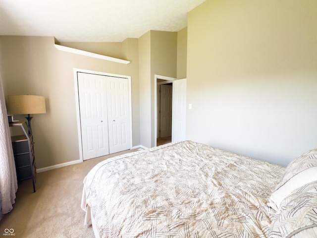 8017 Cardinal Cv W, Indianapolis, IN 46256 - bedroom with vaulted ceiling, light colored carpet, and a closet
