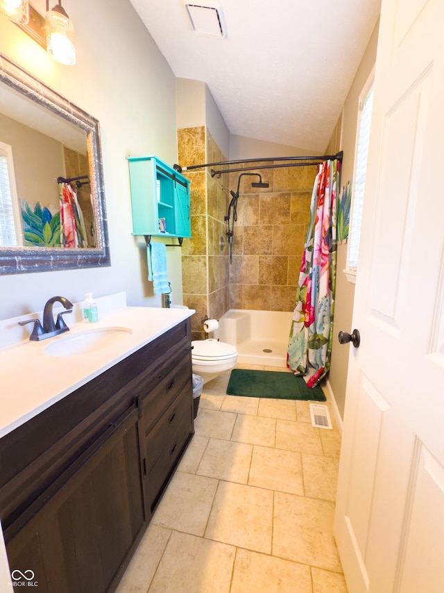 8017 Cardinal Cv W, Indianapolis, IN 46256 - full bath featuring vanity, tiled shower, vaulted ceiling, and tile patterned floors