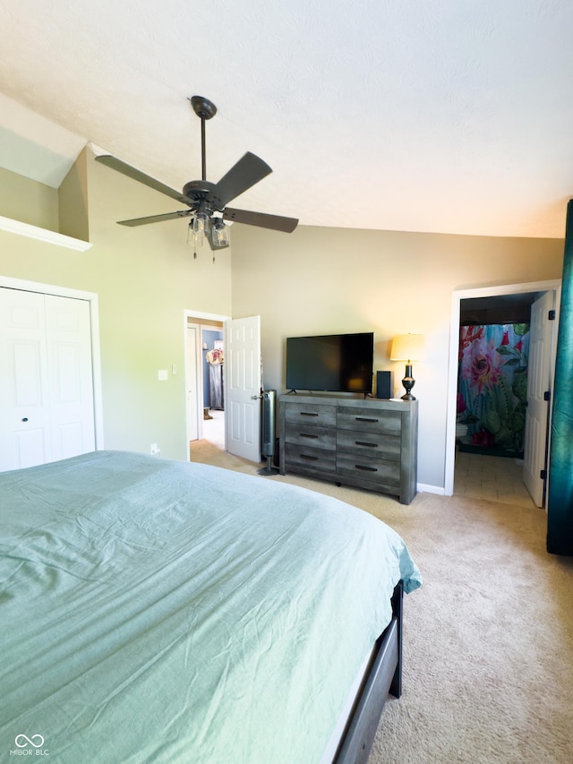 8017 Cardinal Cv W, Indianapolis, IN 46256 - bedroom with light carpet, vaulted ceiling, and a ceiling fan