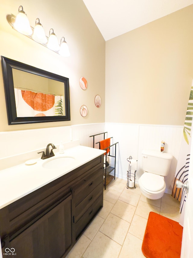 8017 Cardinal Cv W, Indianapolis, IN 46256 - full bath with vanity, wainscoting, and tile patterned flooring