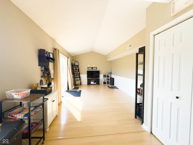 8017 Cardinal Cv W, Indianapolis, IN 46256 - corridor featuring light wood-style floors and lofted ceiling