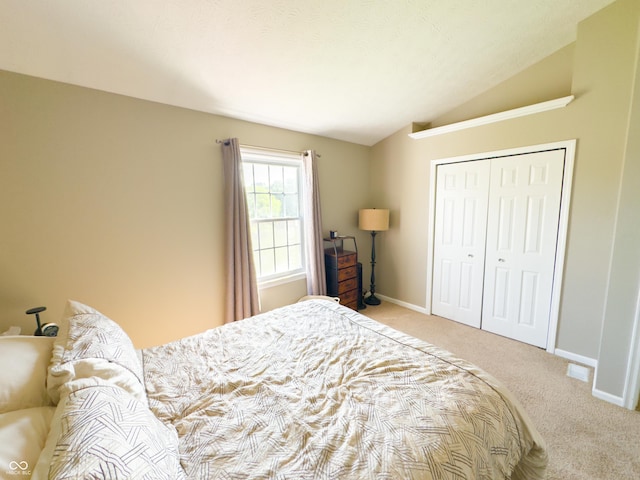 8017 Cardinal Cv W, Indianapolis, IN 46256 - bedroom featuring light colored carpet, lofted ceiling, and a closet