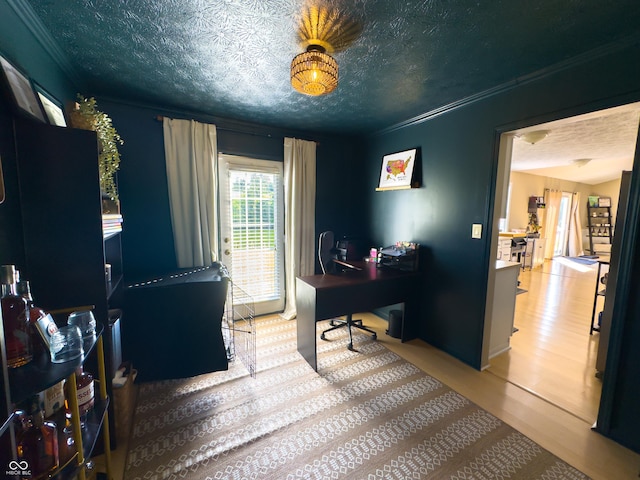 8017 Cardinal Cv W, Indianapolis, IN 46256 - office area featuring crown molding, wood finished floors, and a textured ceiling