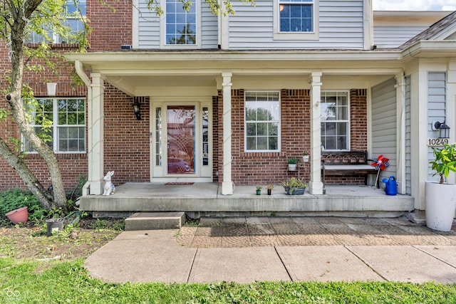 10249 Winlee Ct, Indianapolis, IN 46236 - entrance to property featuring brick siding and covered porch