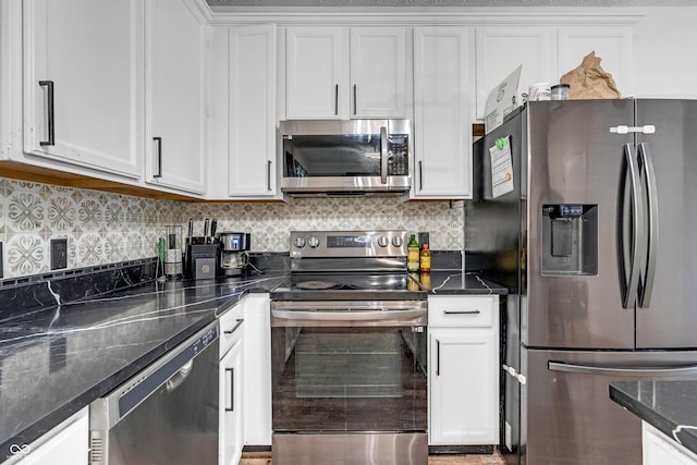 10249 Winlee Ct, Indianapolis, IN 46236 - kitchen featuring stainless steel appliances, white cabinetry, and backsplash