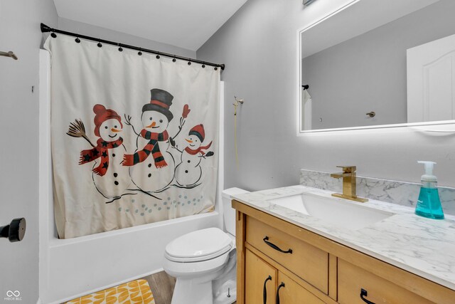 10249 Winlee Ct, Indianapolis, IN 46236 - full bath featuring vanity, shower / bath combo, and wood finished floors