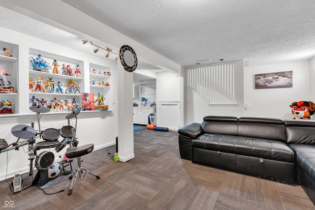 10249 Winlee Ct, Indianapolis, IN 46236 - carpeted living room featuring a textured ceiling and stairway