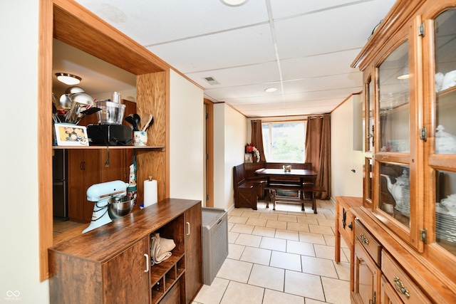 4020 S Lynhurst Dr, Indianapolis, IN 46221 - corridor featuring light tile patterned floors