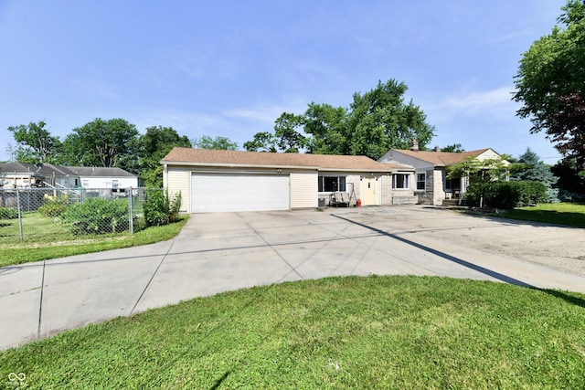 4020 S Lynhurst Dr, Indianapolis, IN 46221 - ranch-style house featuring an attached garage and driveway