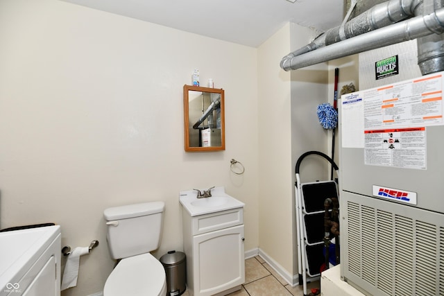 4020 S Lynhurst Dr, Indianapolis, IN 46221 - bathroom featuring vanity, tile patterned flooring, and heating unit