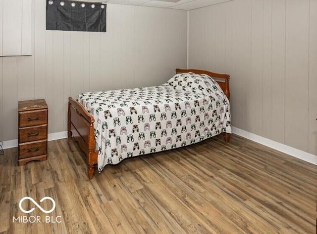 3040 Revere Ct, Columbus, IN 47203 - bedroom featuring wood finished floors and baseboards