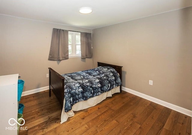 3040 Revere Ct, Columbus, IN 47203 - bedroom featuring wood finished floors