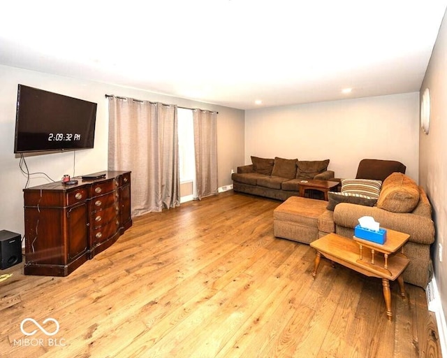 3040 Revere Ct, Columbus, IN 47203 - living area with light wood-type flooring and recessed lighting