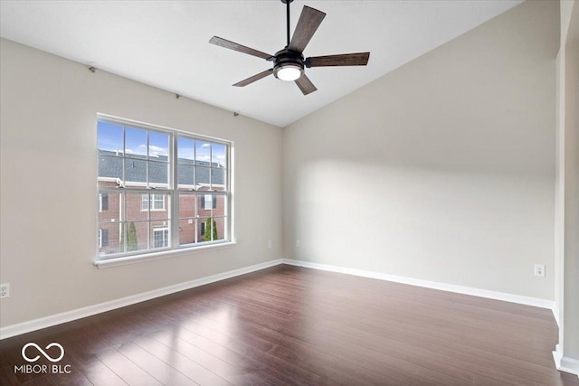 8256 Jo Ellen Dr, Fishers, IN 46038 - empty room with dark wood-style flooring, a ceiling fan, and vaulted ceiling