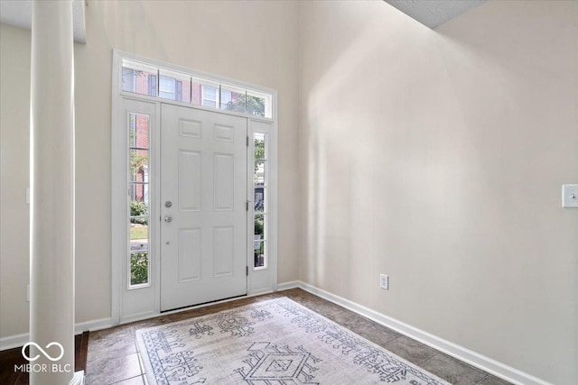 8256 Jo Ellen Dr, Fishers, IN 46038 - tiled foyer entrance featuring baseboards