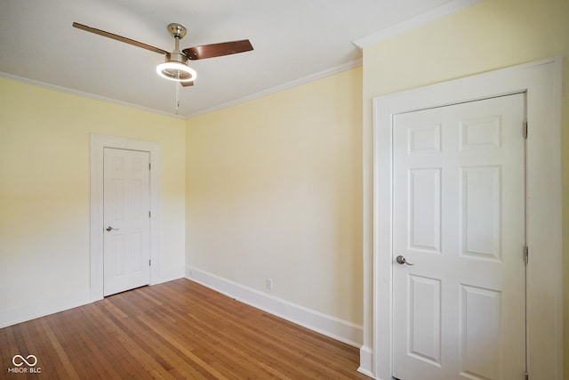 5050 Carrollton Ave, Indianapolis, IN 46205 - unfurnished room featuring a ceiling fan, wood finished floors, and ornamental molding