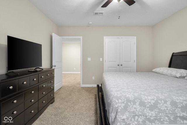 2533 Violet Way, Columbus, IN 47201 - bedroom featuring light carpet, a closet, and ceiling fan