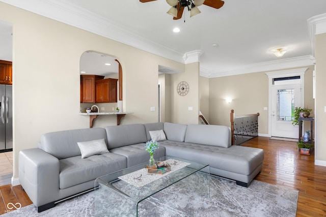 2533 Violet Way, Columbus, IN 47201 - living room with ceiling fan, crown molding, wood finished floors, recessed lighting, and arched walkways