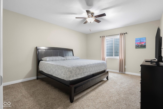 2533 Violet Way, Columbus, IN 47201 - bedroom with light carpet and a ceiling fan
