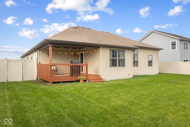 2533 Violet Way, Columbus, IN 47201 - rear view of house with a fenced backyard, roof with shingles, and a deck