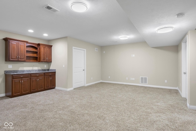 2533 Violet Way, Columbus, IN 47201 - bar area featuring light colored carpet and a textured ceiling
