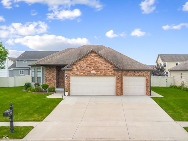 2533 Violet Way, Columbus, IN 47201 - ranch-style house featuring brick siding, concrete driveway, roof with shingles, and a garage