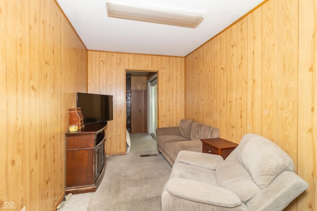 1003 N Broadway St, Greenfield, IN 46140 - living room featuring carpet and wood walls