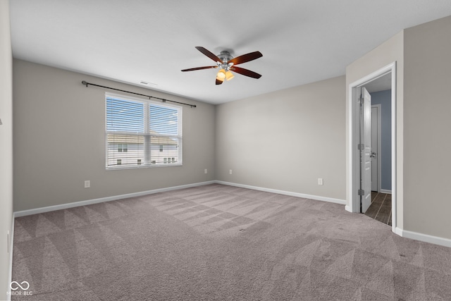 5398 Marigold Dr, Plainfield, IN 46168 - carpeted empty room with ceiling fan and baseboards