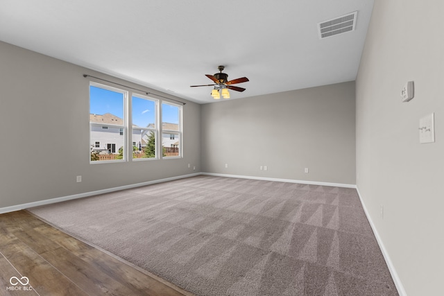 5398 Marigold Dr, Plainfield, IN 46168 - carpeted spare room with ceiling fan and baseboards