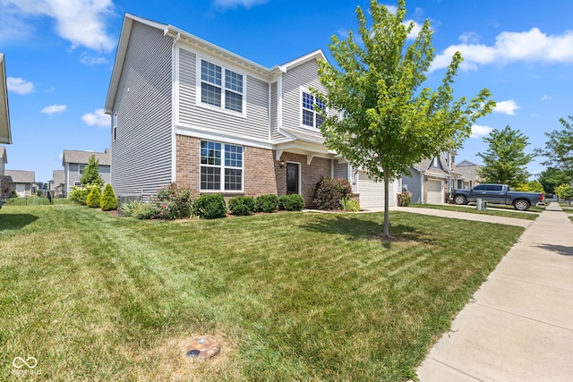 5398 Marigold Dr, Plainfield, IN 46168 - view of front facade with driveway, brick siding, and a front yard