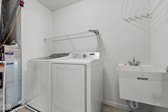 5398 Marigold Dr, Plainfield, IN 46168 - washroom with water heater and washing machine and clothes dryer