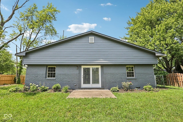 6233 Lafayette Rd, Indianapolis, IN 46278 - rear view of house with brick siding and a patio area