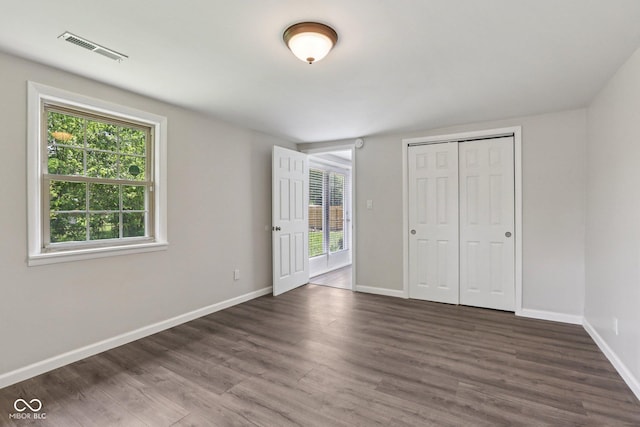 6233 Lafayette Rd, Indianapolis, IN 46278 - unfurnished bedroom with wood finished floors and a closet