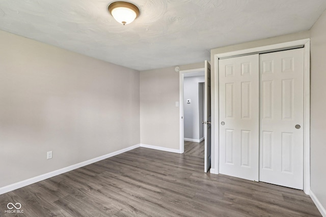 6233 Lafayette Rd, Indianapolis, IN 46278 - unfurnished bedroom with wood finished floors and a closet