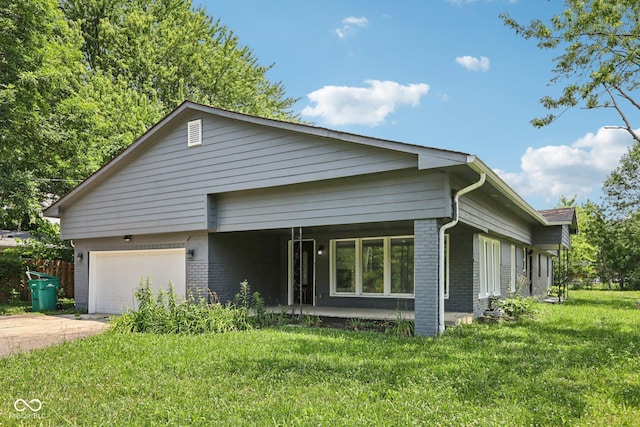 6233 Lafayette Rd, Indianapolis, IN 46278 - view of front of house with brick siding, an attached garage, a front yard, concrete driveway, and a porch